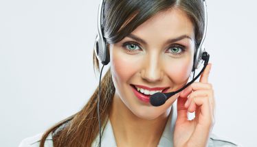 Customer support operator close up portrait.  call center smiling operator with phone headset.